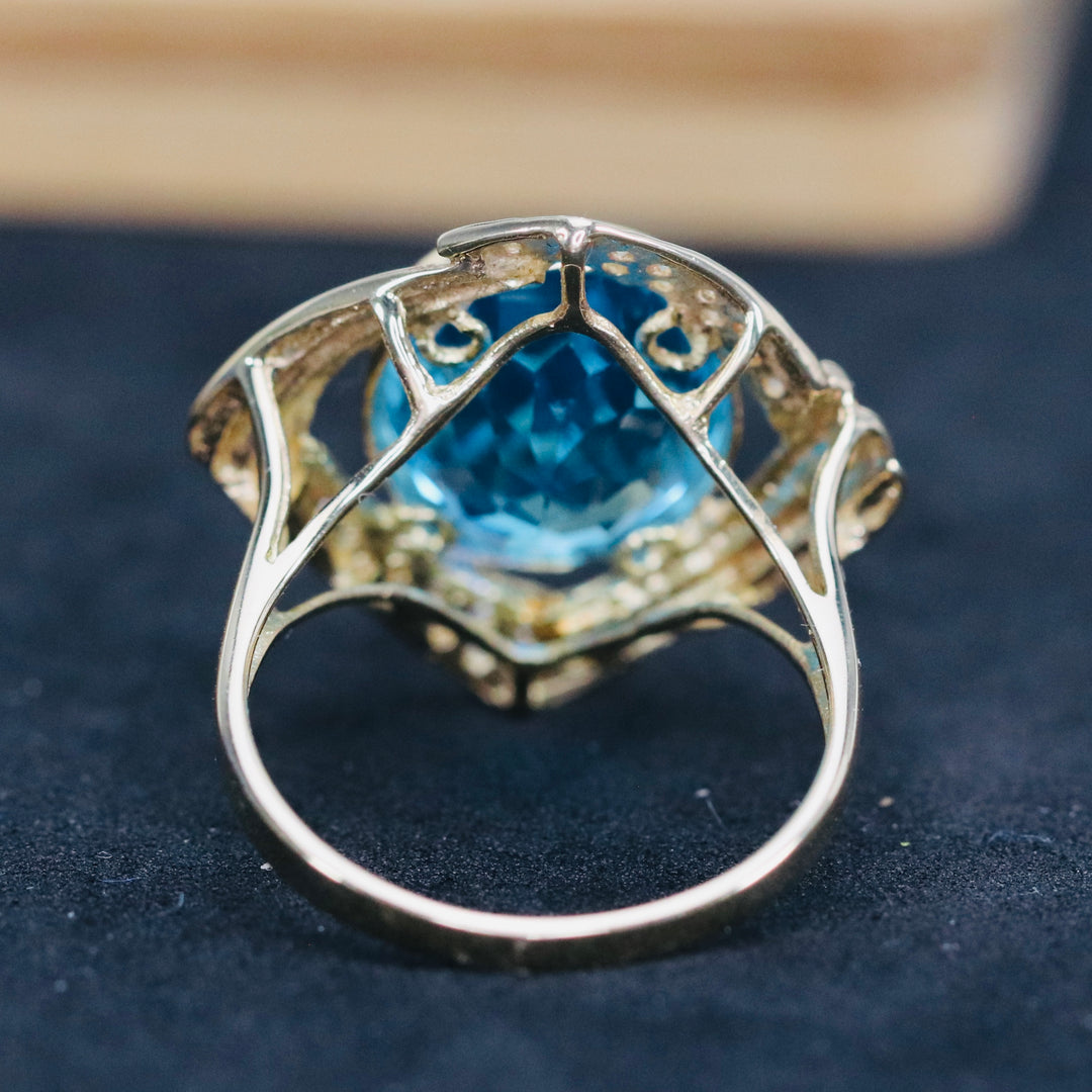 CLEARANCE!! Swiss blue topaz and diamond ring in 14k yellow gold
