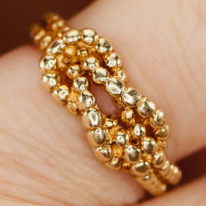 Lovers knot ring in 14k yellow gold