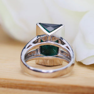 Estate green tourmaline and diamond ring in platinum
