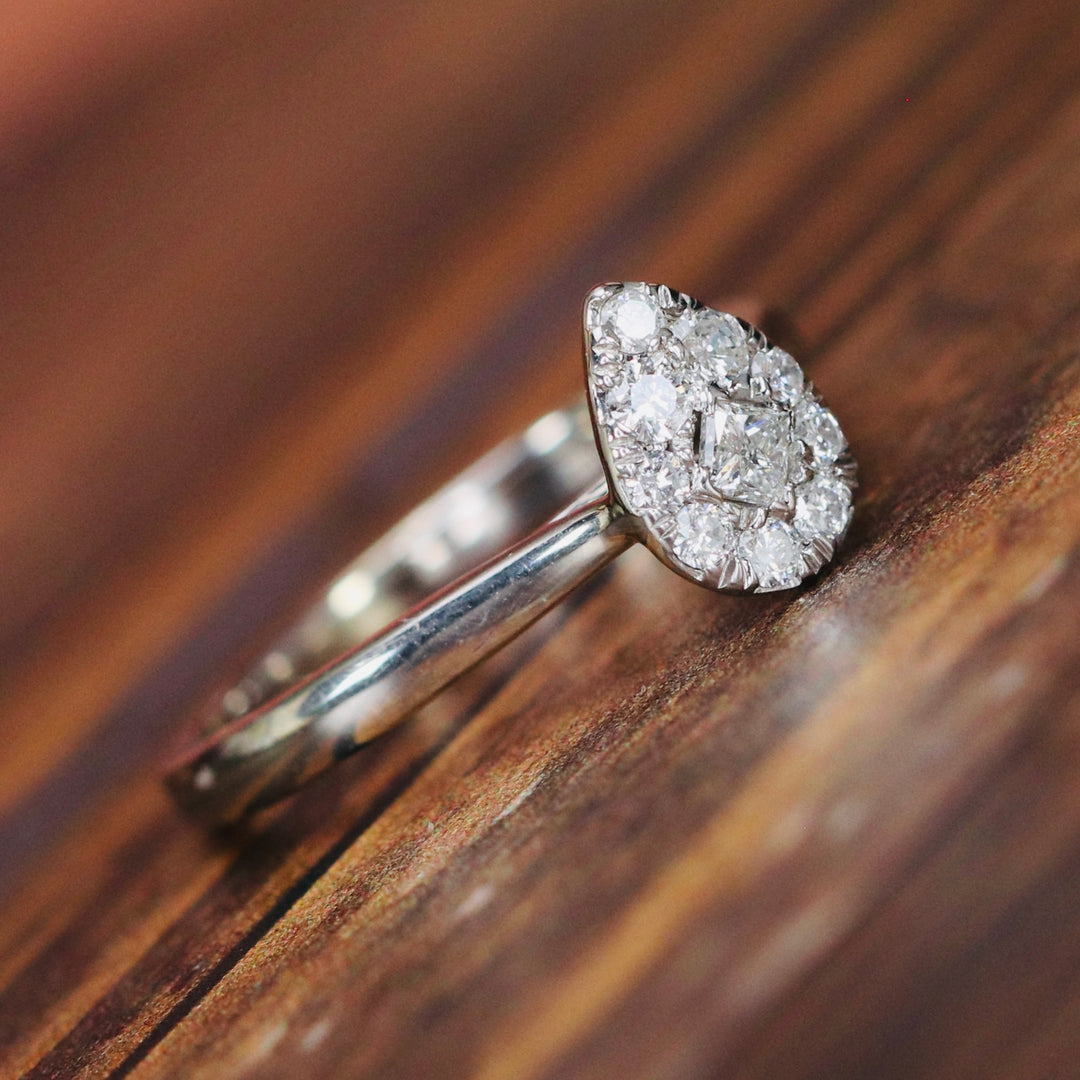 Pear shape diamond cluster ring in 14k white gold