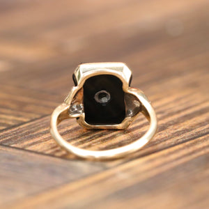 Onyx and diamond vintage ring in yellow gold