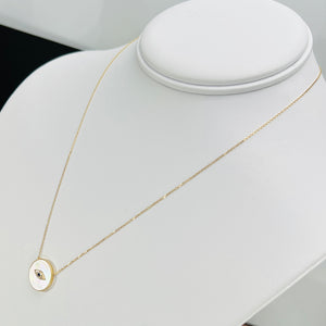 Sapphire and diamond evil eye necklace by Effy in 14k yellow gold