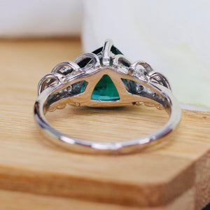 Estate chunky pear shaped green tourmaline and diamond ring in platinum