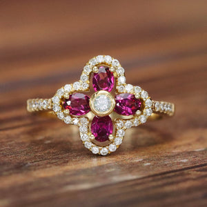 Rhodolite and diamond ring in 14k yellow gold