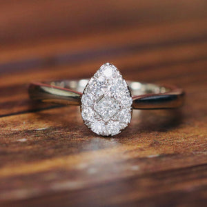 SPECIAL: Pear shape diamond cluster ring in 14k white gold