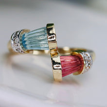 Load image into Gallery viewer, Carved blue topaz and pink tourmaline ring in yellow gold