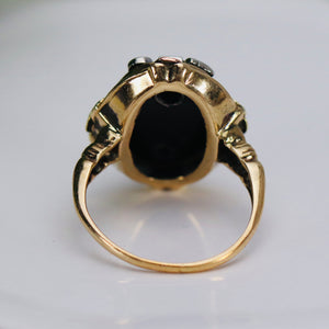 Unusual diamond cross oval onyx ring in yellow gold