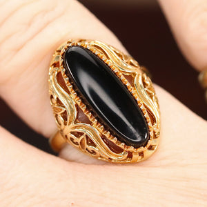 Vintage onyx ring in yellow gold