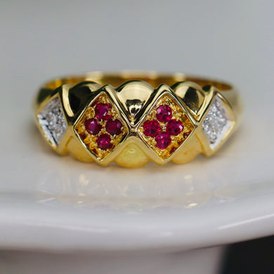 Wide band ring with ruby, and diamond in 18k yellow gold